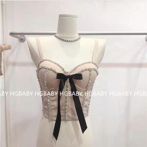 rhinestone corset top with black bow